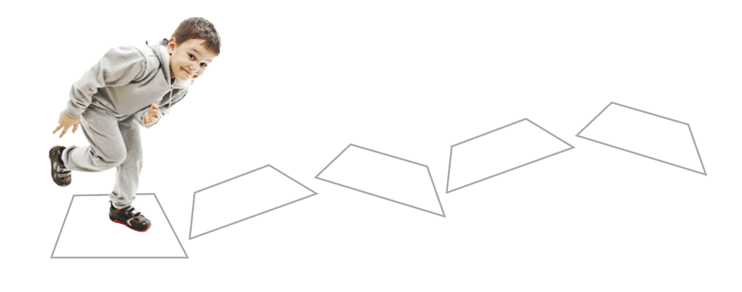 A boy jumping onto a trail of rectangles