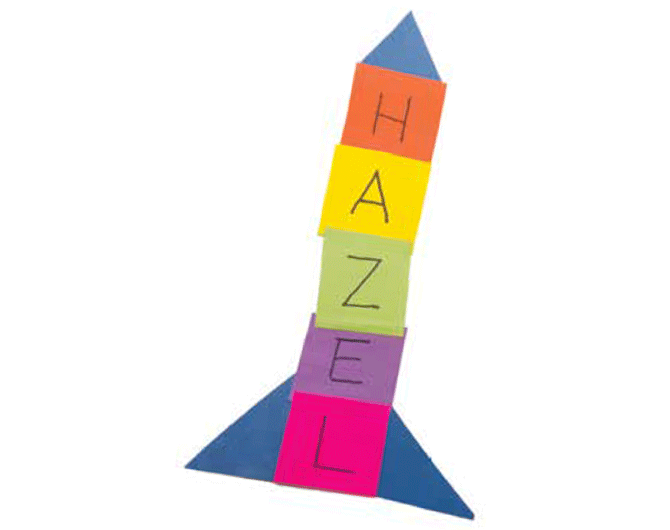 A paper rocket that spells out the name "Hazel"