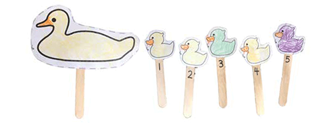 Paper ducks on popsicle sticks